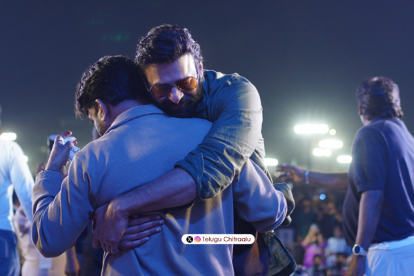 Prabhas hugging Maruthi at The Raja Saab pre-release event